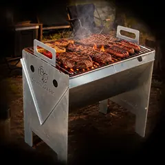 B.C VULKAN com a grelha cheia de carnes e linguiças, em brasa